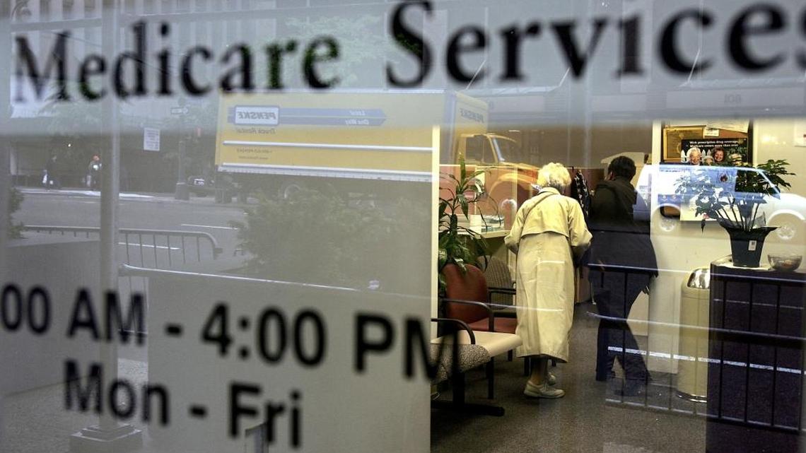 This 2006 photograph shows a Medicare enrollment office in New York City. This week, a Florida-based Medicare Advantage insurer and a former executive in the company agreed to pay $32.5 million to settle a whistle blower lawsuit that alleged Freedom Health defrauded the federal government.