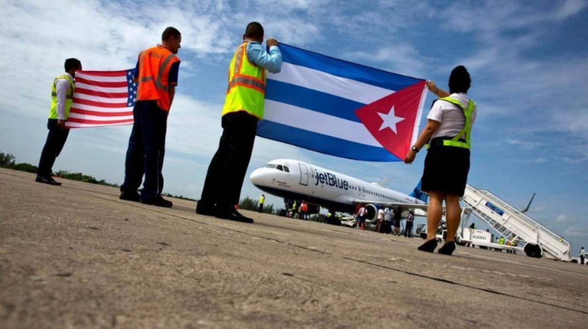 Airport workers receive JetBlue flight 387 on the airport tarmac in Santa Clara, Cuba on Aug. 31. On Thursday, the airline announced $54 one-way flights to Havana.