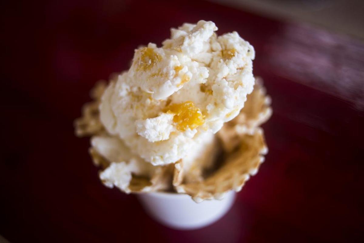 A fresh cone of the “House Special” liquid nitrogen ice cream, with peaches and cheesecake, at the recently opened Krave N Joy at 1135 53rd Avenue West in Bradenton. The restaurant sells tacos and burritos encased in house-made tortillas, as well as liquid nitrogen ice cream.