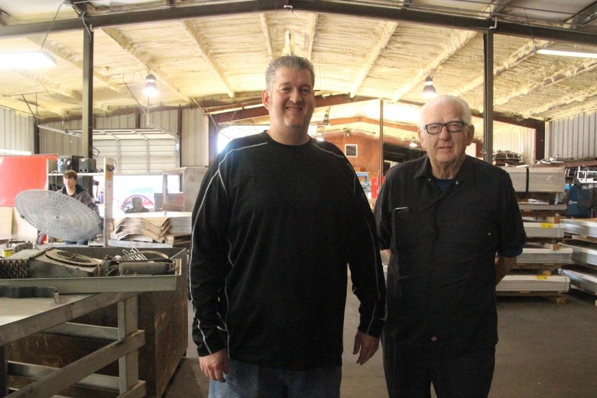 Matt Edmunds, left, stands with his father Tom Edmunds at Edmunds Metal Works. The company has been in business 40 years in the Bradenton area.