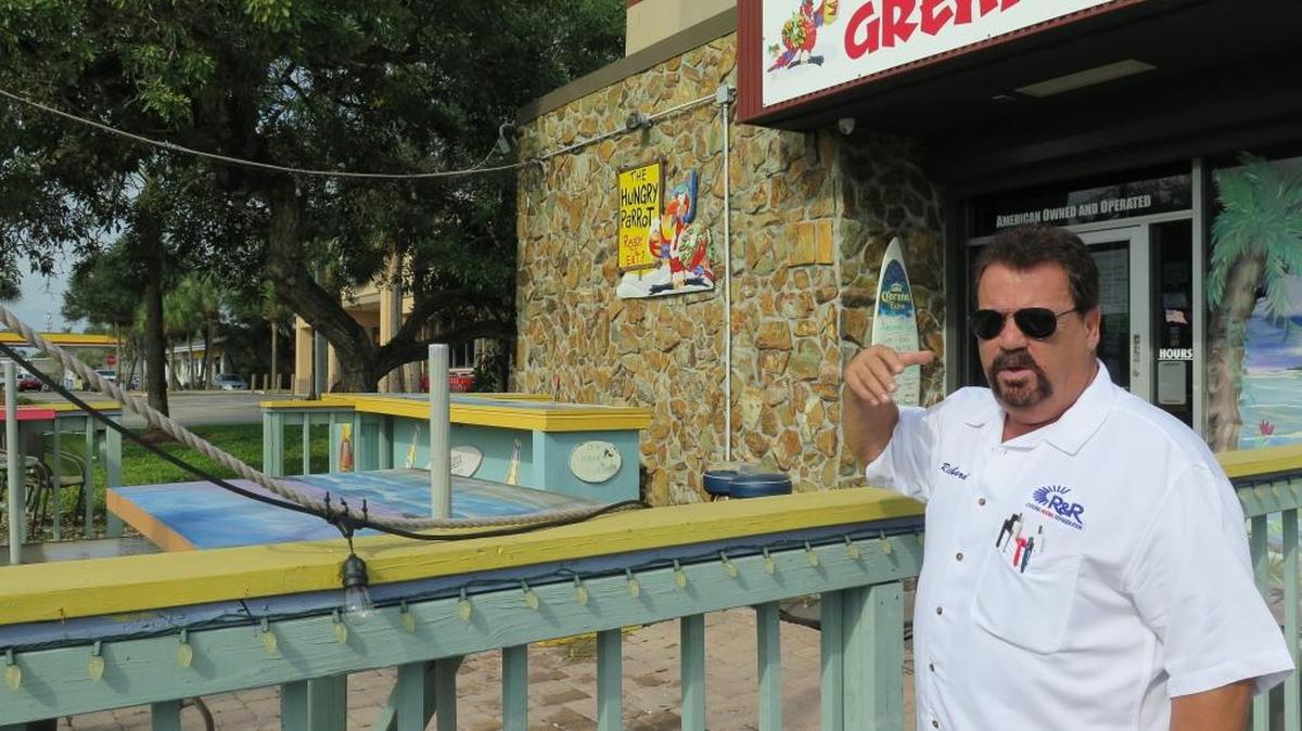 Restaurant owner Rick Nicoletti stands outside of the Hungry Parrot, 5718 Manatee Ave. W. He opened the seafood restaurant and tiki bar in August 2014.
