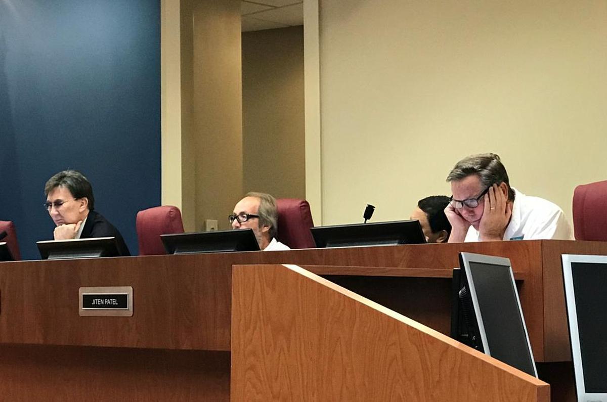 Listening intently to a presentation during the Manatee County Tourist Development Council meeting on Monday were, from left, Venon DeSear, Doug Copeland, Jiten Patel and Ed Chiles.