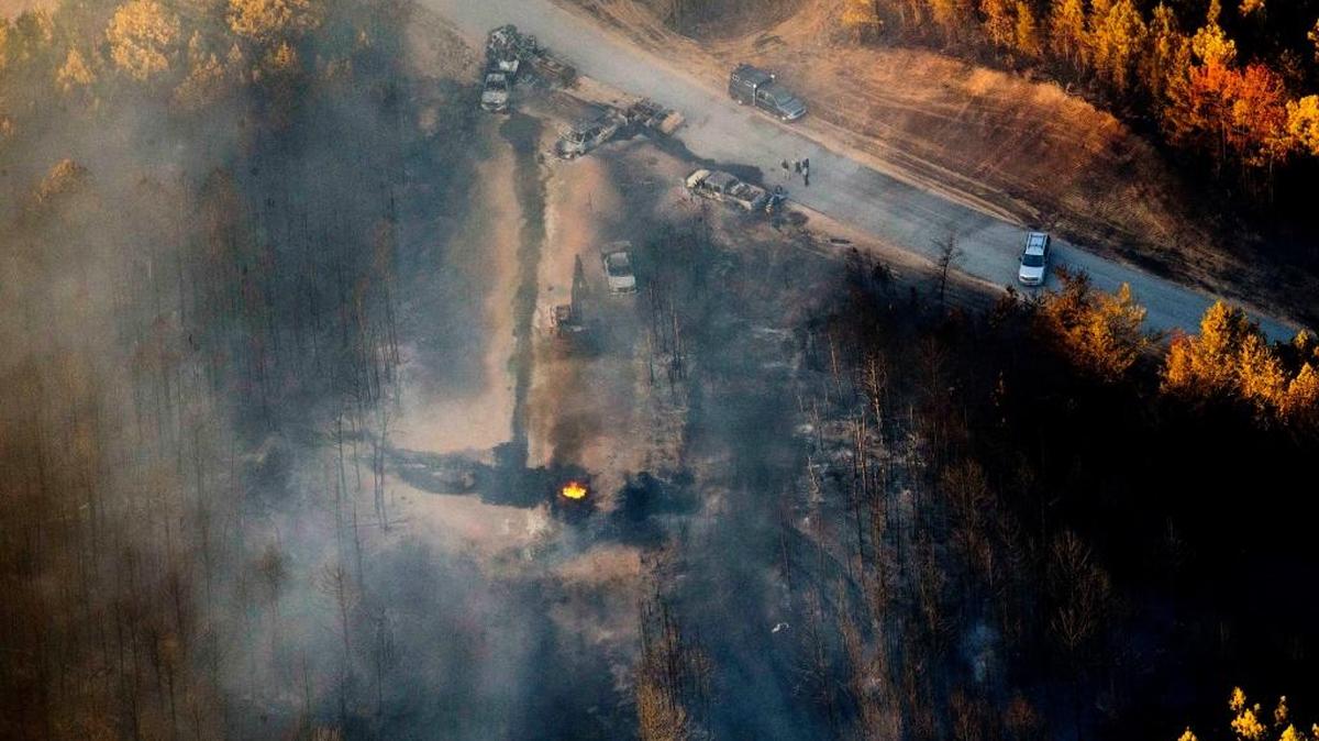 A flame continues to burn after Monday’s Colonial Pipeline explosion in Alabama. The blast happened about a mile west of where the pipeline ruptured in September.