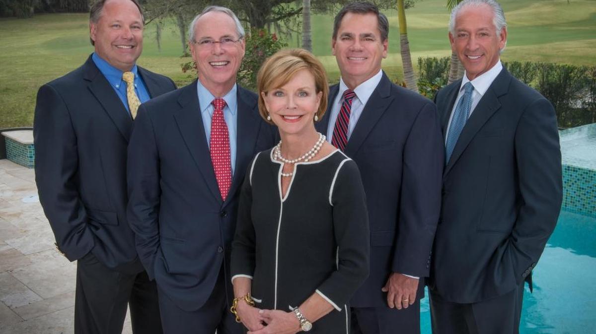 Key staff at Neal Communities include, from left, Randy Turkovics, Pat Neal, Charlene Neal, Michael Storey and Michael Greenberg. The company recorded record sales in 2017.