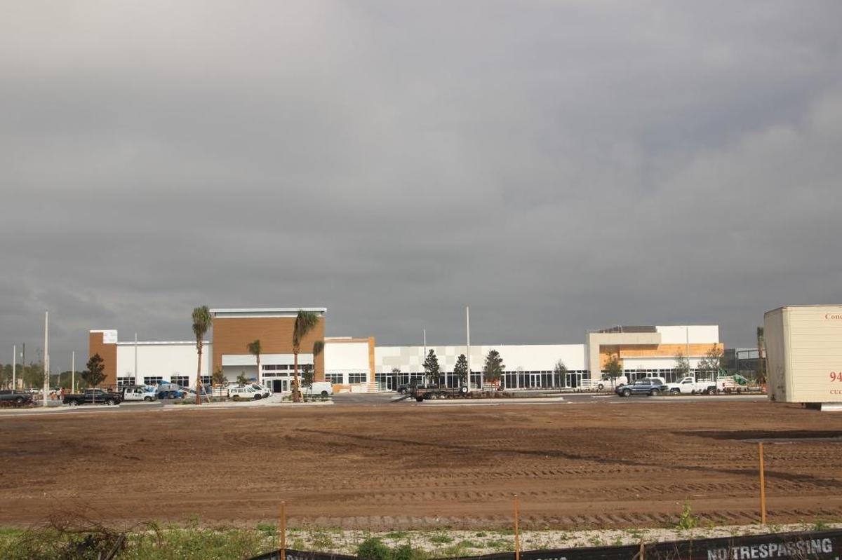 An Earth Fare supermarket, at left, will anchor The Green at Lakewood Ranch shopping center under construction at State Road 70 East and Lakewood Ranch Boulevard.