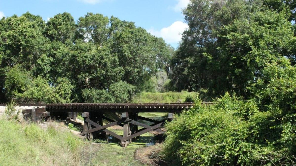 Train tracks run along the southern border of the Parrish Lakes and former Moccasin Wallow LLC property west of Parrish.