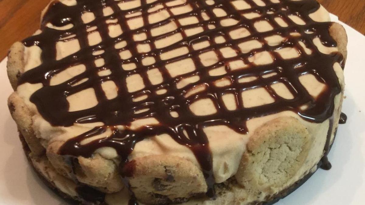 Chocolate syrup tops this homemade ice cream cake.