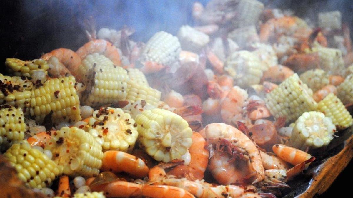 This year’s menu features a wide variety of Cajun dishes, including boiled shrimp with sweet corn and andouille sausage.