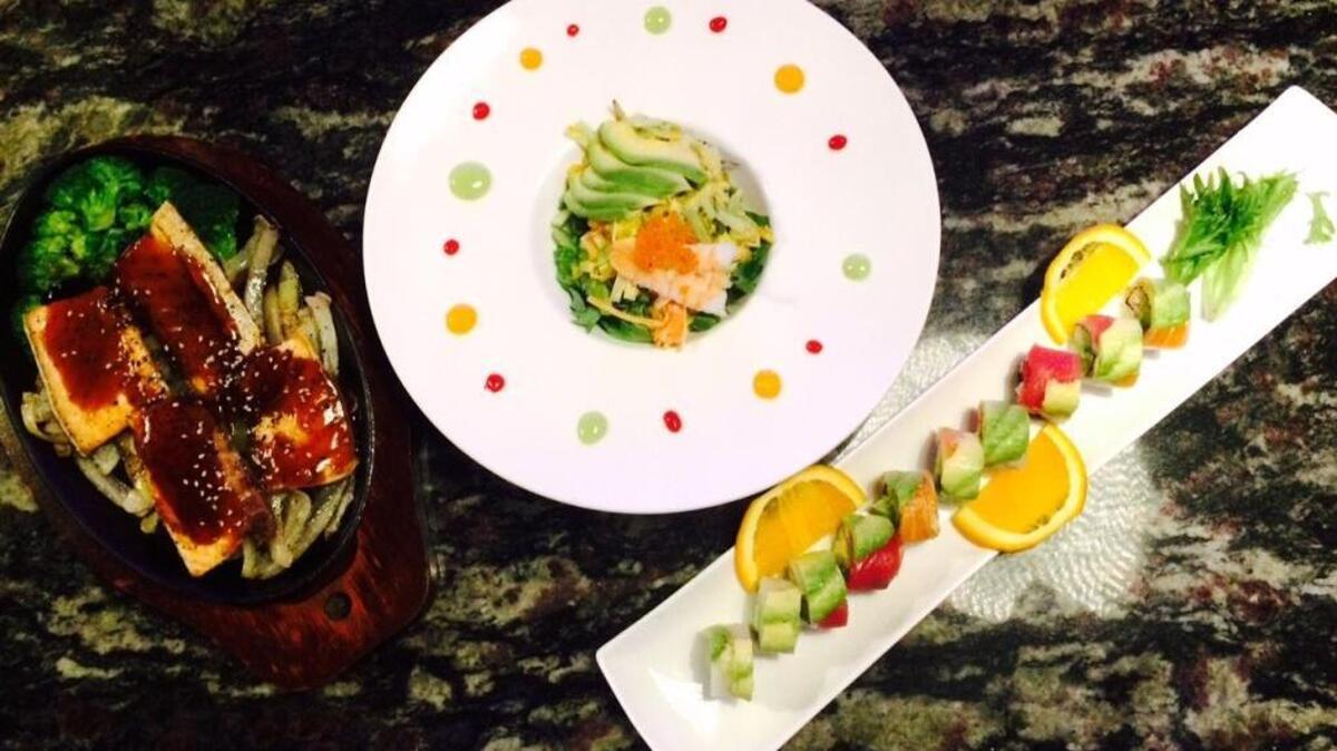 Attendees of Yuniku’s cooking classes on March 29 and April 4 will learn to make three different dishes, from left to right: Teriyaki salmon, an avocado salad and a Rainbow sushi roll. The $30 cost includes enjoying those dishes for dinner accompanied by a cocktail.