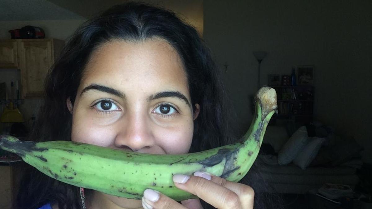 Herald reporter Amaris Castillo snaps a selfie with a green plantain for “Cravings.”