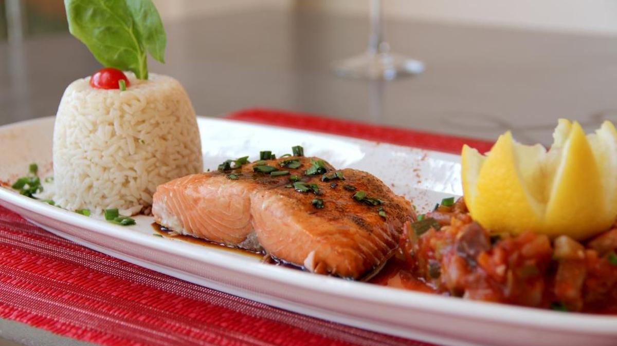 Lolita Tartine’s Baked Salmon Filet with teriyaki sauce served with a duo of house-made ratatouille and rice