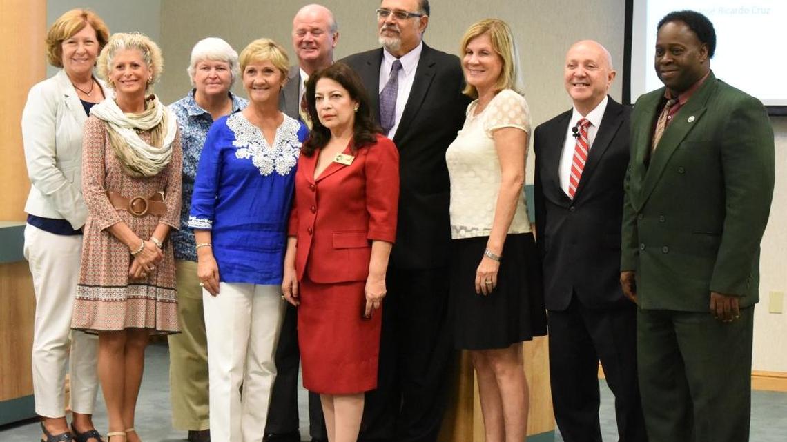 The Manatee County Port Authority poses for a photo with Jose Matto, president and chairman of the Hispanic Commerce Coalition; Connie Palomo Flores, executive director of the Salvadoran American Chamber of Commerce of Florida; and Port Manatee executive director Carlos Buqueras.