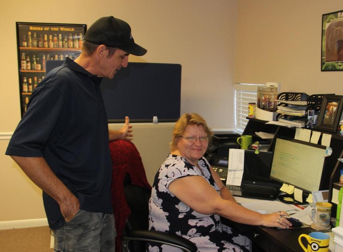 Richard Krause talks to Sam Ratcliffe, right, at Richards Plumbing Repair. The company was a finalist for the 2017 Manatee Chamber of Commerce Small Business of the Year awards.