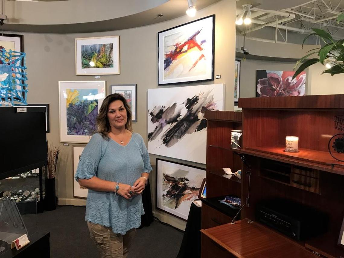 Jennifer Perry, business manager for J&J Gallery Collective Art and Gifts, which opened at Lakewood Ranch Main Street this month, says the new business represents 34 artists and will grow that number to more than 40.