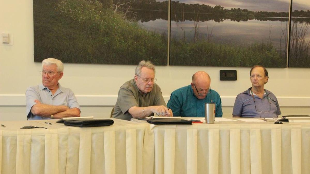 Not happy with cell phone service at Lakewood Ranch are Community Development District supervisors, from left, Gilbert Pearce, Robert Swiatek, Alan Roth and Gary Berns.