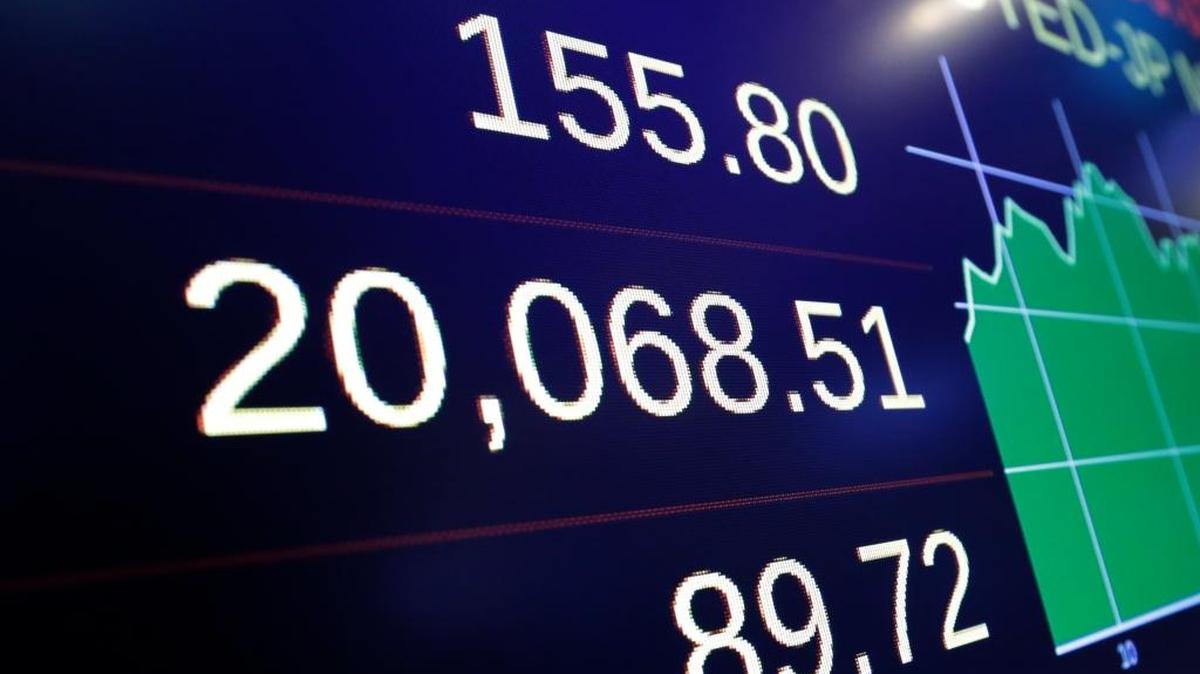 The Dow Jones industrial average gained 155.80 points on Wednesday to close above 20,000 points for the first time, the latest milestone in a record-setting drive for the stock market.