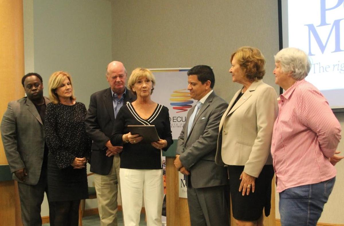 Vanessa Baugh, center, presented Manuael Echeverria Castro, Ecuador trade commissioner, with a plaque for his presentation to the port authority on Tuesday. The trade commissioner presented the authority with several Panama hats, which were made in his country. Shown above, from left, are Charles Smith, Carol Whitmore, Stephen Jonsson, Baugh, Castro, Betsy Benac and Priscilla Whisnant Trace.