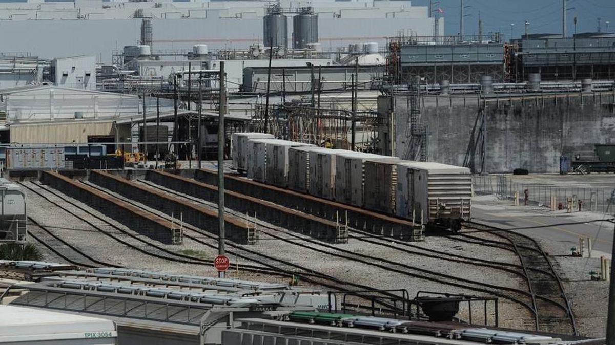 The search for the suspect who shot a coworker at the Bradenton Tropicana plant Monday night continues after police say they located a woman who left “unwillingly” with the shooter. The train yard at the Tropicana plant is shown in this Bradenton Herald file photo.