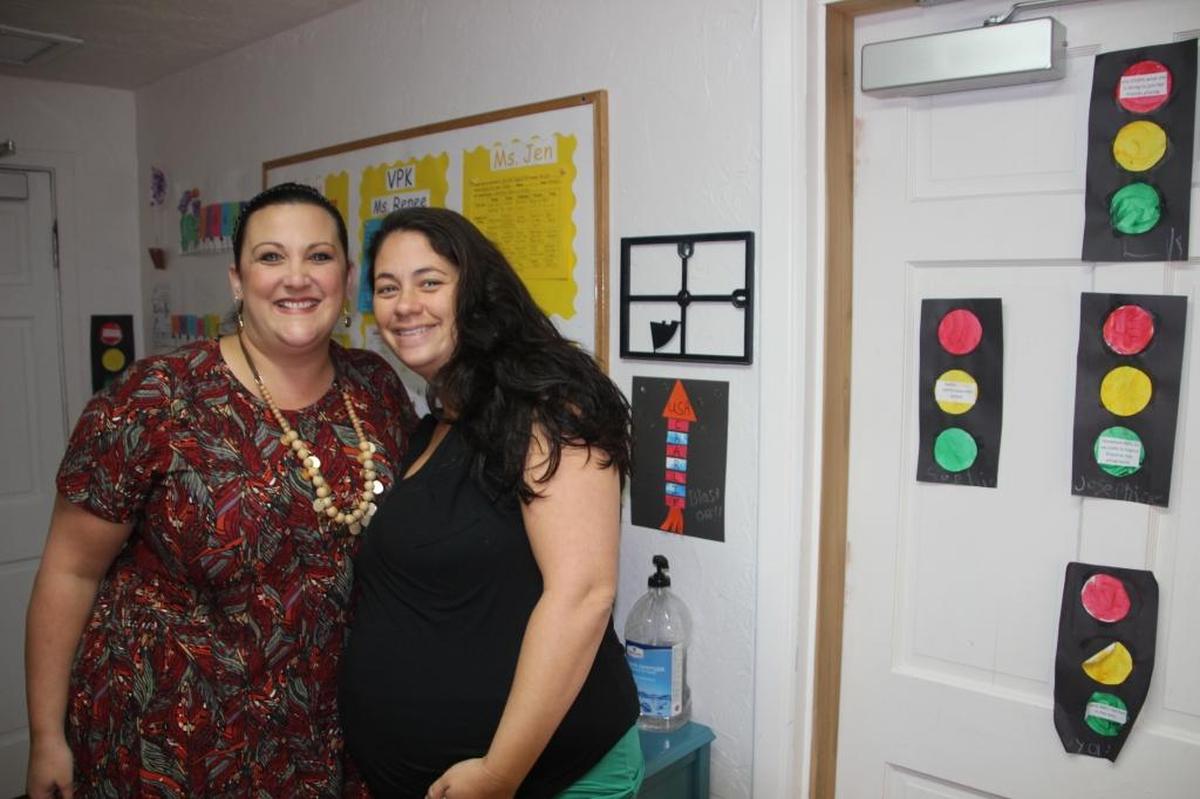 Taniel Macy, left, with Jen Smith, the assistant director of Bright Futures Daycare & Preschool in Bradenton.