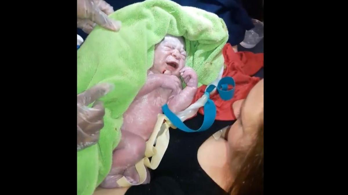 Passenger Shelley Hedgecock Starks posted video of baby Christoph Lezcano in the arms of his mother Cristina Penton after Penton gave birth to him on a Spirit Airlines flight from Fort Lauderdale to Dallas.