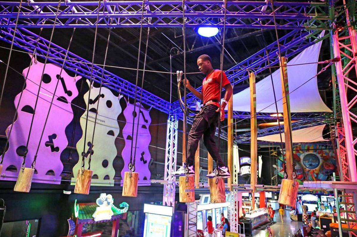 Joseph Louizaire walks on the Rope Course at Xtreme Action Park.