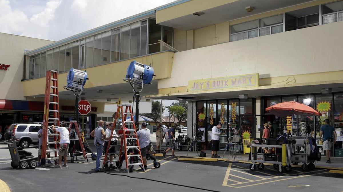 In this July 24, 2013 photo, crews prepare the set for rehearsal and taping of an episode of "Burn Notice" in Miami. (AP Photo/Alan Diaz)