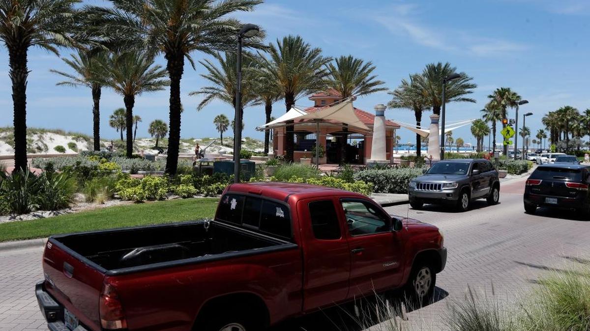 Traffic makes it way down busy S. Gulfview Boulevard, a road that runs along the Gulf of Mexico, Thursday, May 19, 2016, in Clearwater. More travelers are expected to take to the roads and sky this summer thanks to lower gas prices and an upbeat economy. 2016 is shaping up to be the summer of the road trip.