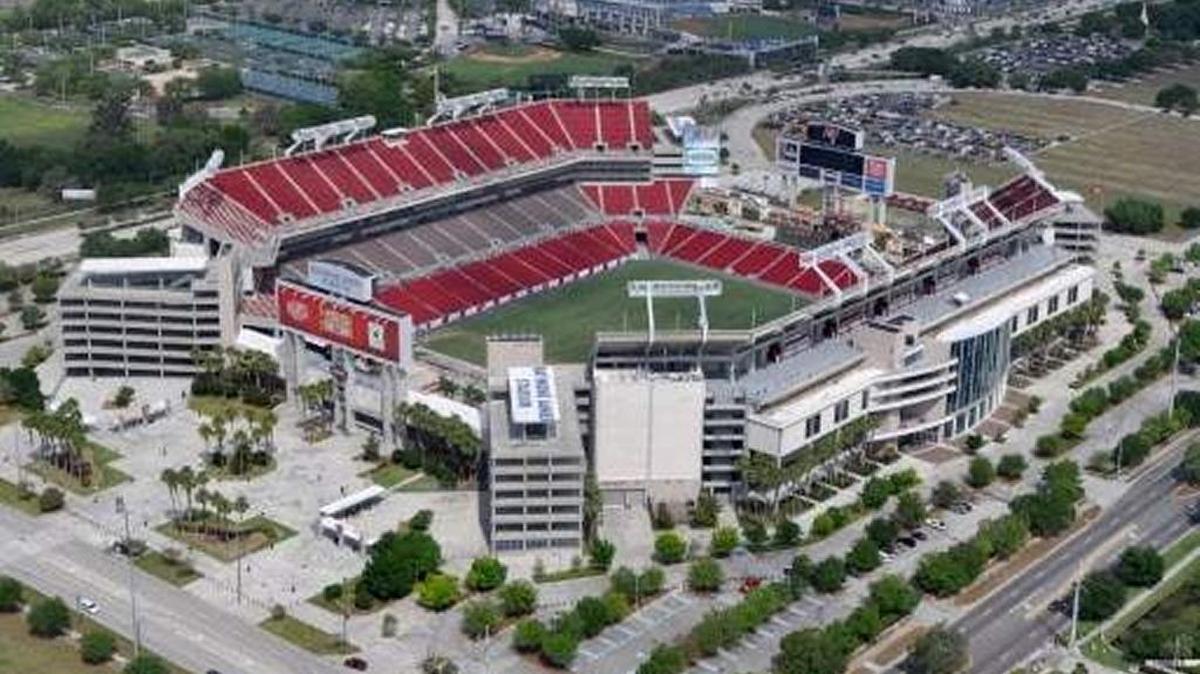 Raymond James Stadium will host the college football national championship game on Jan. 9, but how much of an economic impact the event will have on the Tampa Bay area is up for debate.