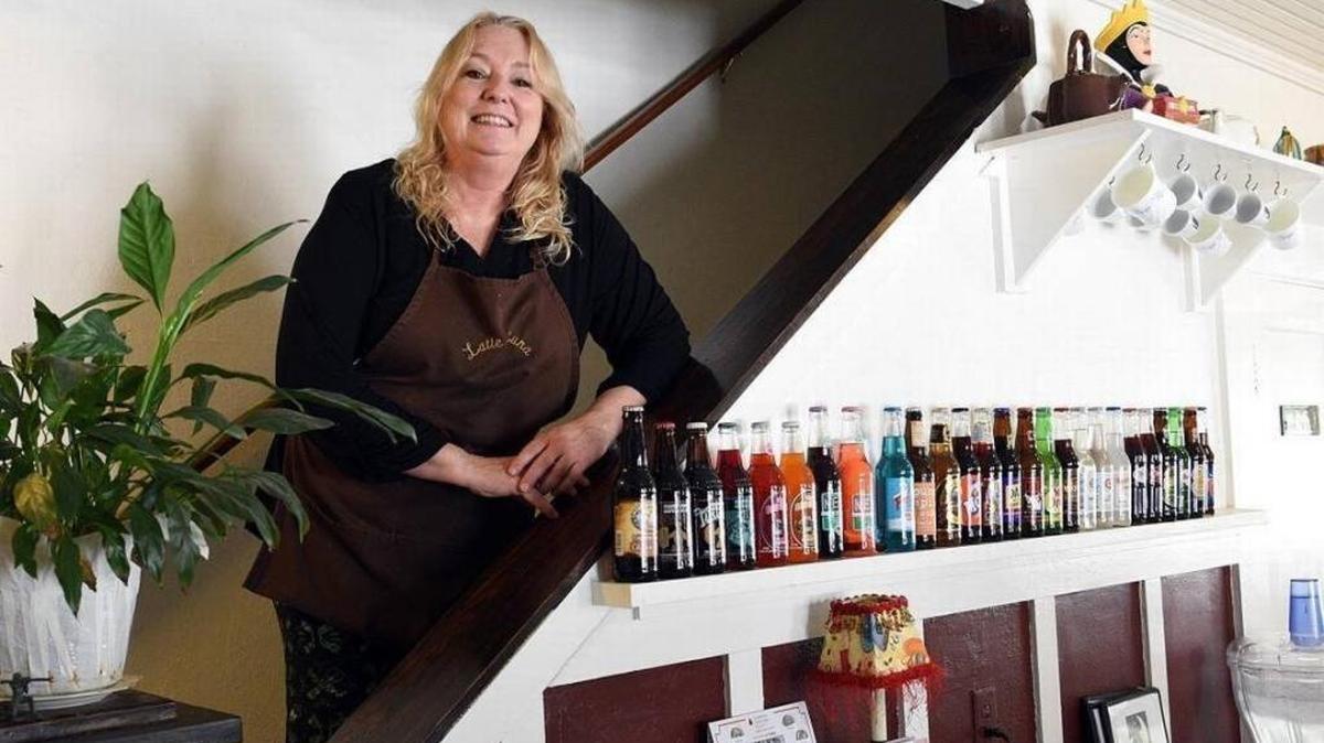 Deb Short poses for a photo in her family-style coffee shop in July 2017. She previously attempted to sell Latte Luna, 2715 Manatee Ave. W., to a new owner, but the attempt was unsuccessful and the shop will permanently close Saturday.