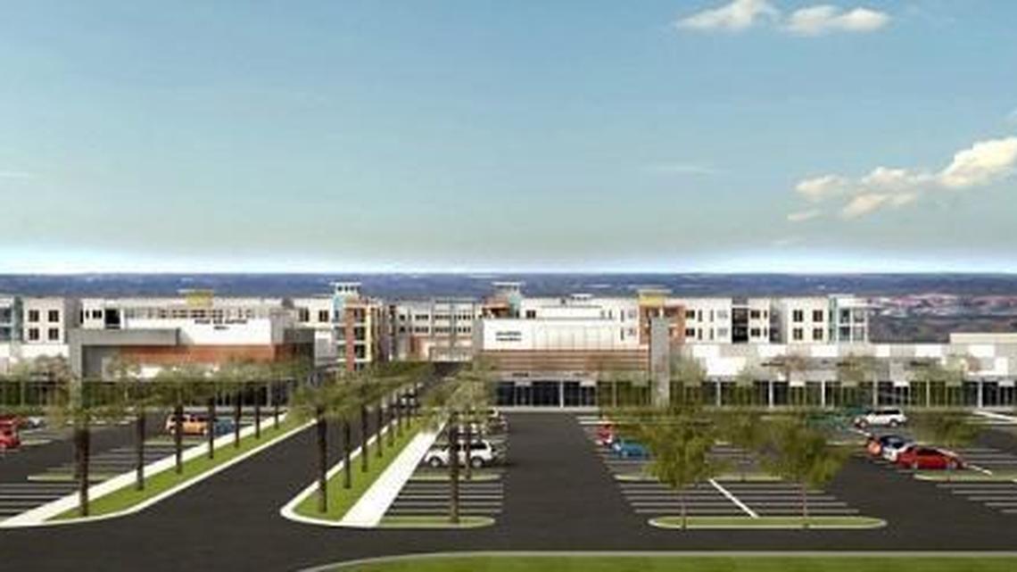 An artist’s rendering of the proposed The Greene at Lakewood Ranch Commercial project shows Earth Fare at left and a fitness center at right.