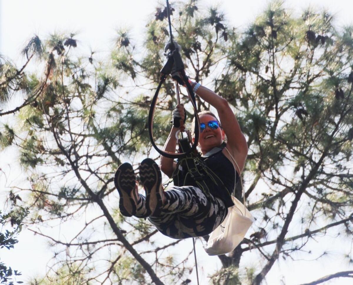 Cindy Rolewski takes a ride on a zip line at TreeUmph! Adventure Course in East Manatee. The Terra Ceia resident was a first-time visitor to the park.