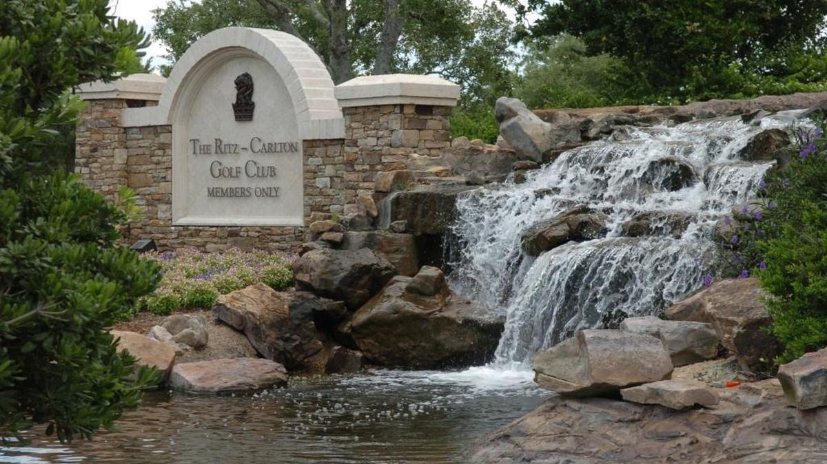 The entrance to the Ritz-Carlton Members Golf Club on Lorraine Road in Lakewood Ranch is marked with a waterfall. Documents filed with Manatee County indicated that multi-family residences are coming to the property.
