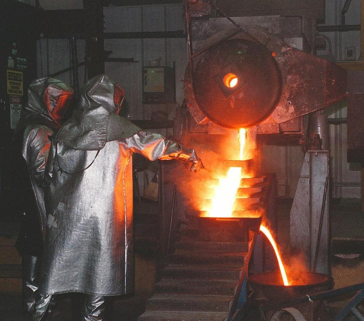 Workers at a gold refinery in Nevada pour molten precious metal. High gold prices during the Great Recession drew small-time operators like Jed and Natalie Ladin into the industry.