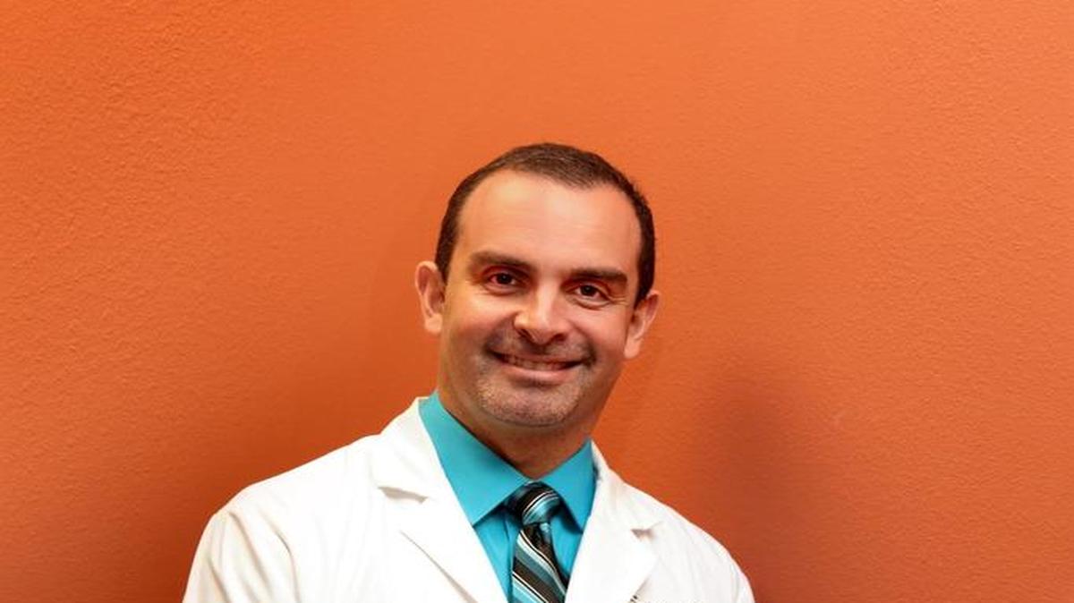 Dr. Jose E. Sarria, board-certified pain medicine and palliative care physician, The Ramos Center for Interventional and Functional Pain Medicine.