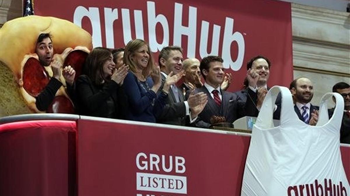 Grubhub CEO Matt Maloney, center.