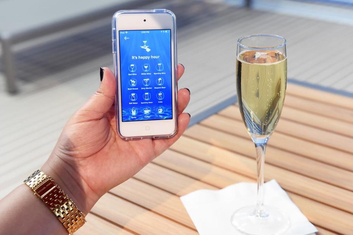 A view of Royal Caribbean’s future app which will let guests order food and drink to be delivered to them anytime, anywhere on board is seen at the Royal Caribbean Sea Beyond event at Duggal Greenhouse at the Brooklyn Navy Yard on Wednesday Nov. 8, 2017, in Brooklyn, New York. (Photo by Diane Bondareff/ Invision for Royal Caribbean Cruises Ltd./AP Images)