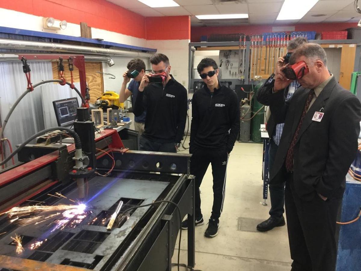 Students in the Southeast High School Student Engineering and Entrepreneurship Program work the plasma cutter as part of their overall training in high-tech manufacturing. Executive Director of Adult, Career and Technical Education Doug Wagner was instrumental in starting the program at Southeast and it is those students that will help spread the program across the Manatee County School District with their innovative work.
