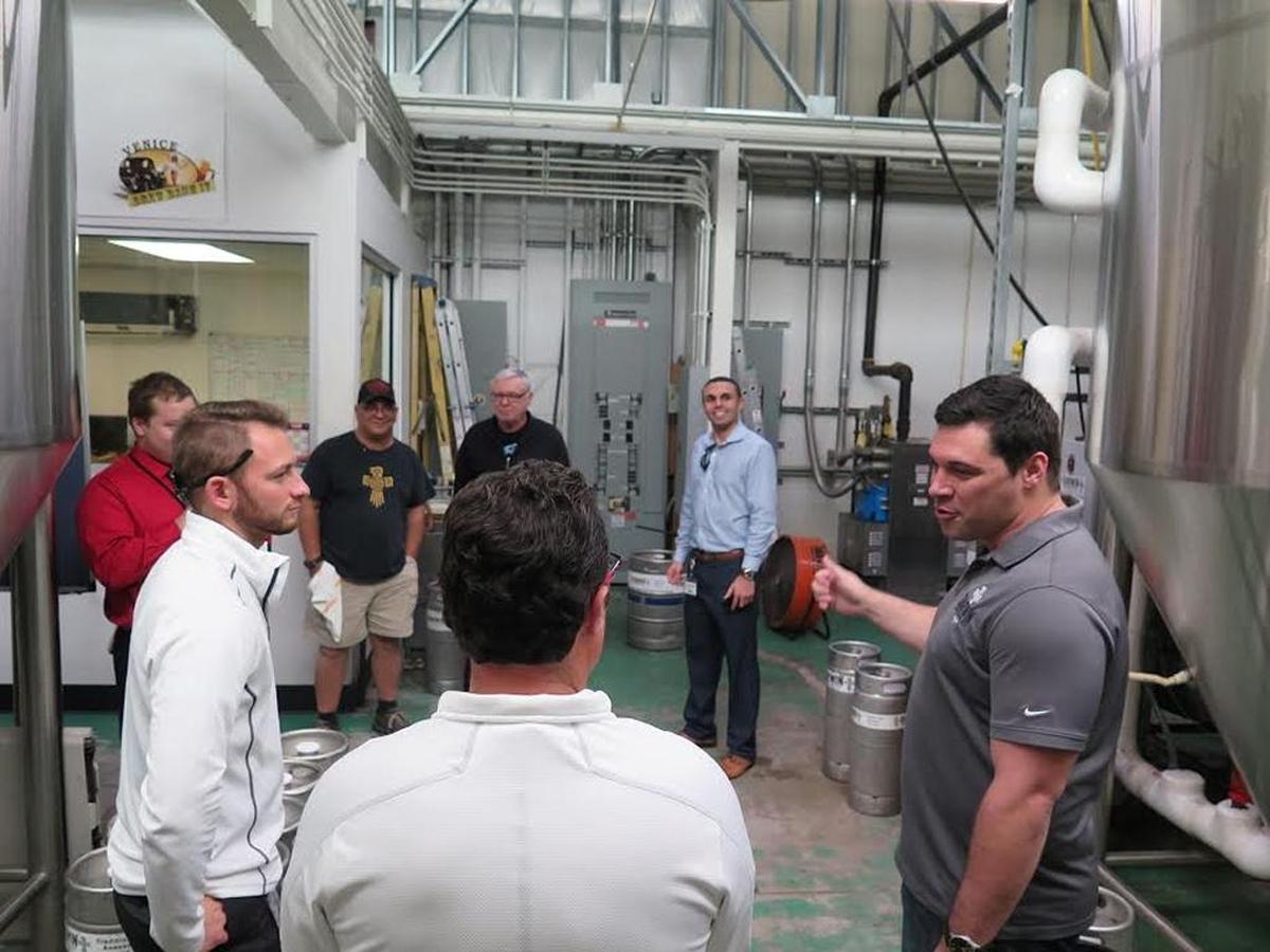 Members of the Pirates organization receive a tour of Darwin Brewing Company in Bradenton on Tuesday.