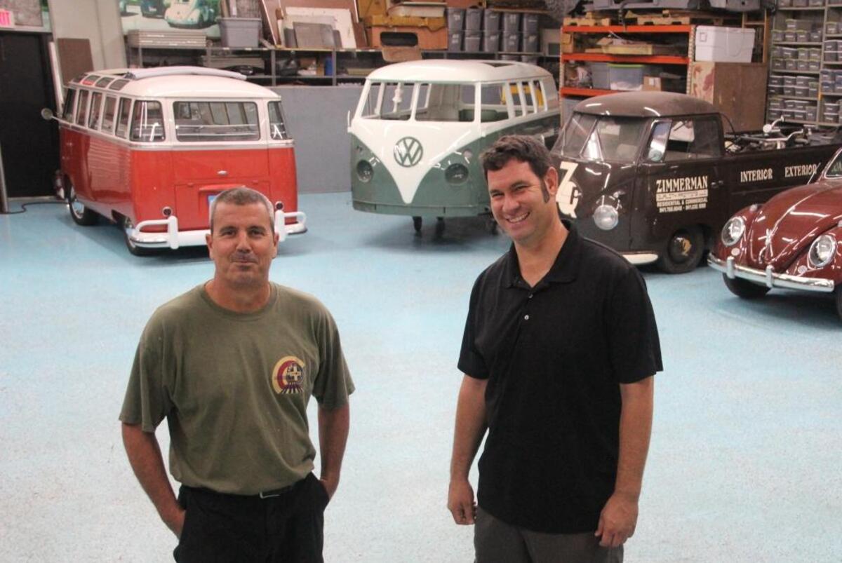 Jimmy Pollack, left, and Kip Zimmerman restore vintage Volkswagen Beetles at Rare and Unique Restoration.