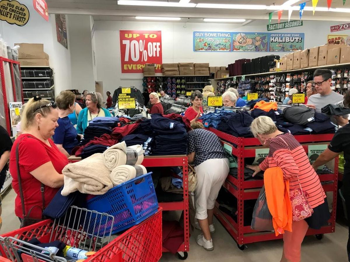 Early bird shoppers at Ollie’s had plenty of company at the store’s grand opening Wednesday. An estimated 600 poured into the store soon after it opened.