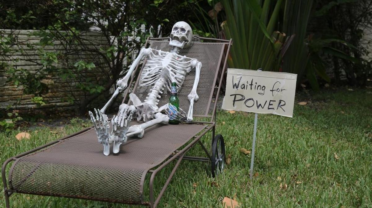 Miami Shores residents Erin McNaughton and Harald Oechsner, lost their power on Sunday Sept. 10, 2017. They feel forgotten by FPL but are still trying to keep their humor. The couple put a skeleton in a lawn chair and placed it on their lawn along NE 12th Ave and NE 97th St, with a sign next to it saying, "waiting for power." As of Monday afternoon, Sept. 18, 2017, the wait was still on.