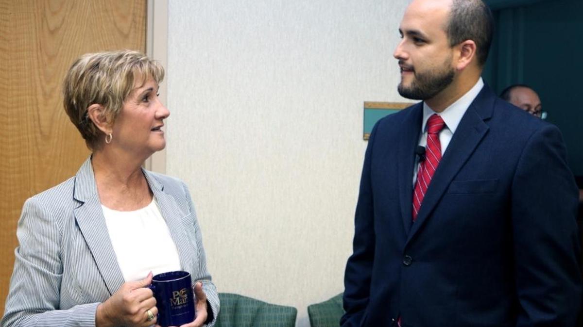 Manatee County Port Authority Chairwoman Vanessa Baugh discusses trade opportunities with Juan C. Barrera, the general deputy director for the United States of ProColombia USA.