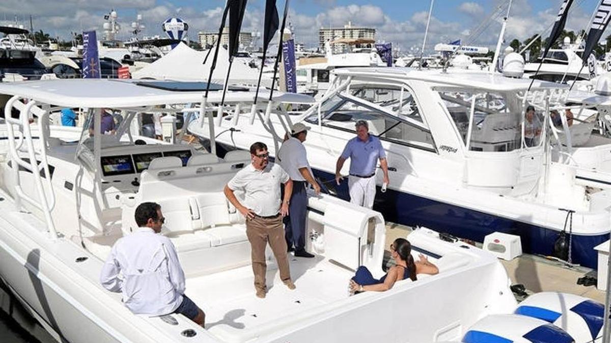 Fort Lauderdale Boat show visitors take a look at a 47ft Intrepid Panacea equipped with four 627 horse power Seven Marine engines at the event in 2016.