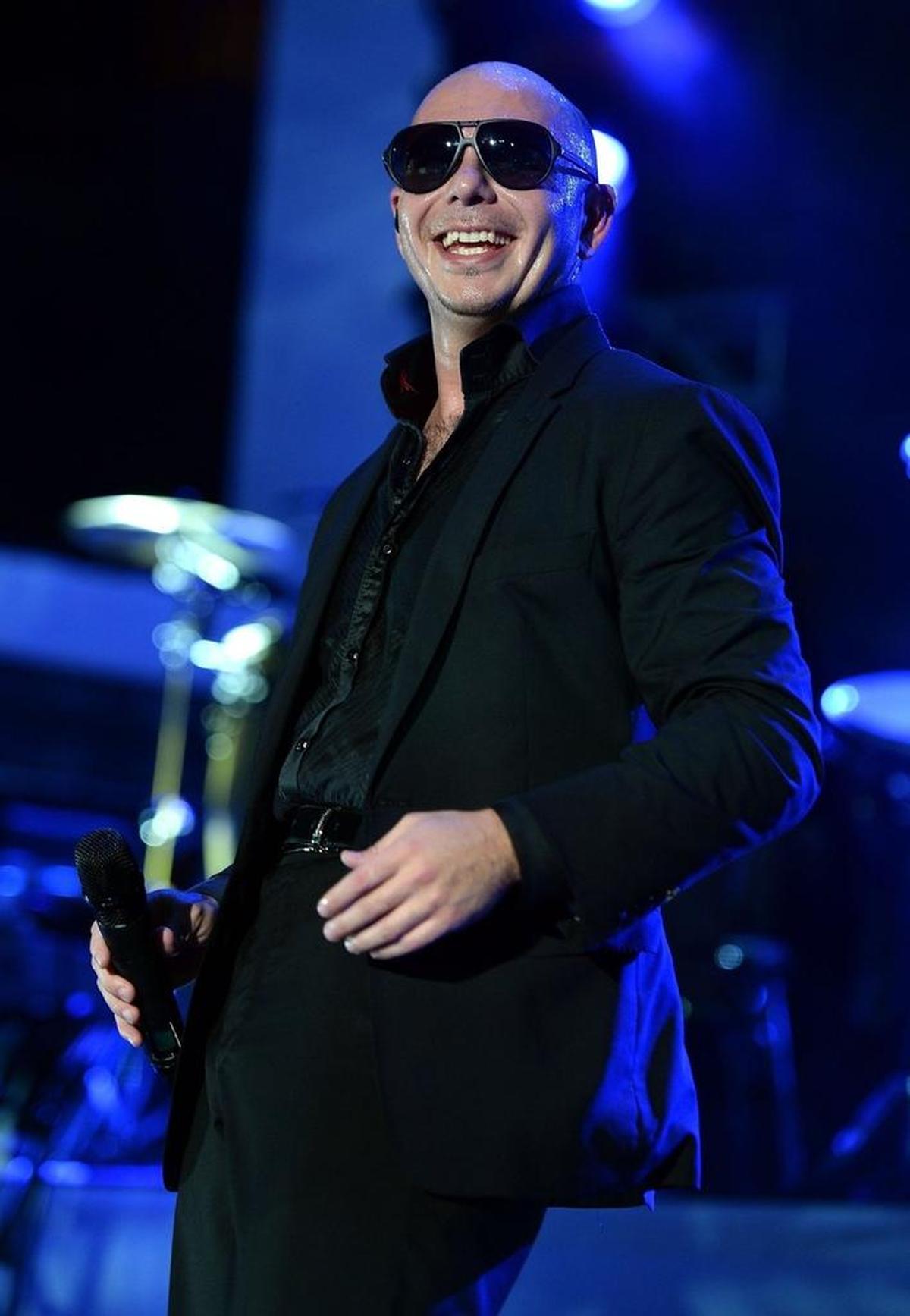 Pitbull performs live at the iHeartRadio Ultimate Pool Party Presented by Visit Florida at Fontainebleau’s BleauLive in Miami on June 29, 2013 in Miami Beach.