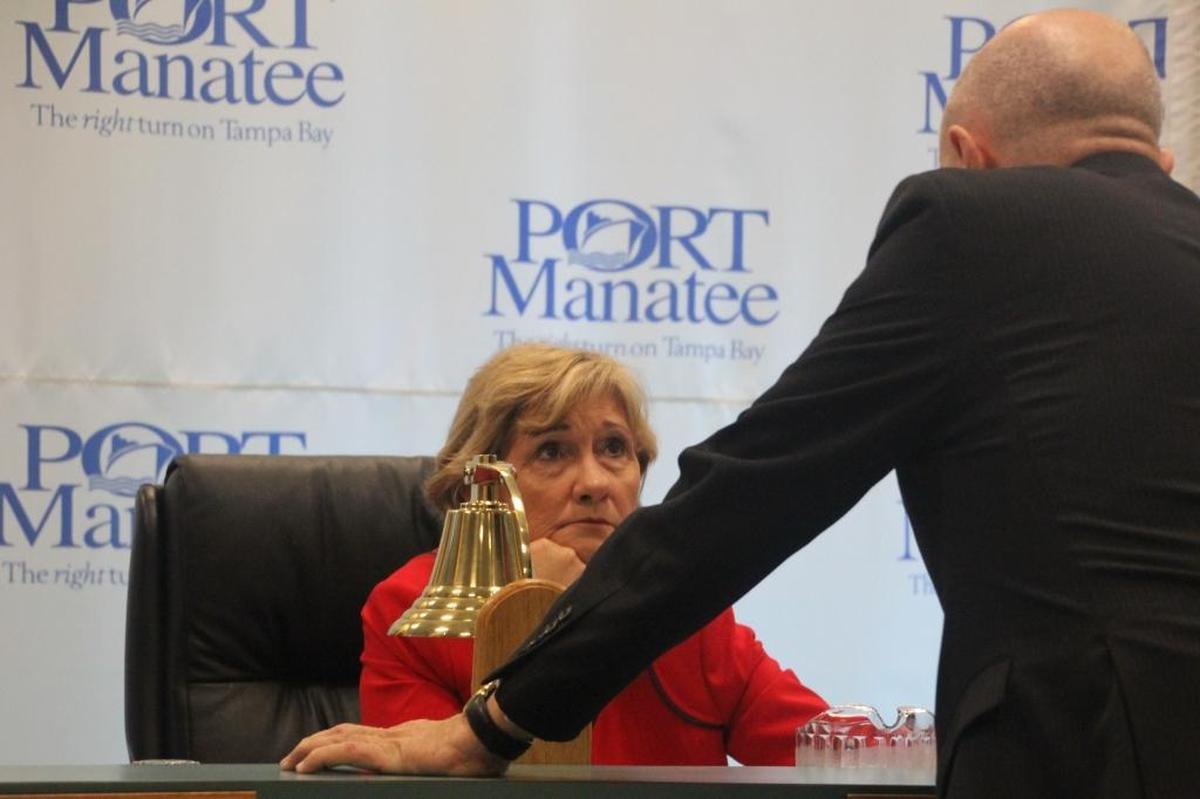 Carlos Buqueras, executive director of the Manatee County Port Authority, talks to Vanessa Baugh, chairman of the port authority, before Thursday’s meeting. Baugh is seeking to negotiate a new contract with Buqueras and present it to the authority no later than February.