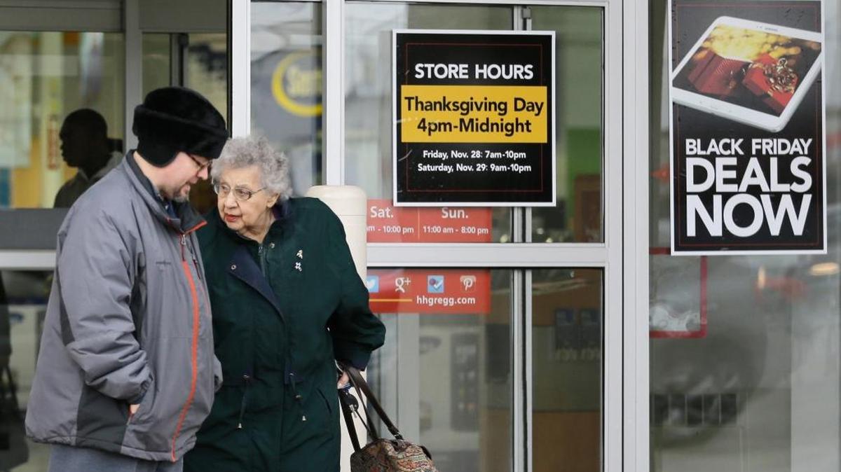 In this Tuesday, Nov. 25, 2014, file photo, a man and a woman leave an Hhgregg store in Mayfield Heights, Ohio. Consumer electronics chain Hhgregg Inc. is going out of business. The Indianapolis company says it will liquidate its assets after filing for bankruptcy protection in March 2017 and failing to find a buyer for the business.