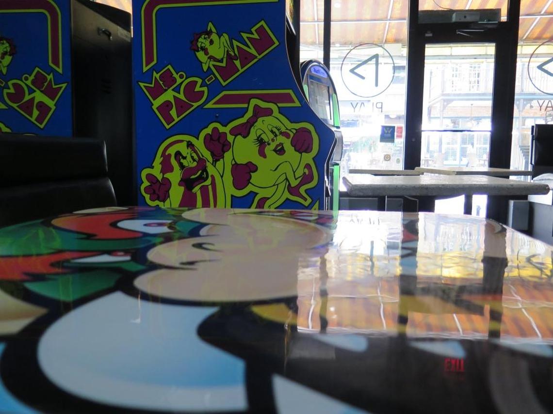 Mario tabletops add to the nostalgic atmosphere at Play Arcade and Bar, 436 12th St. W.