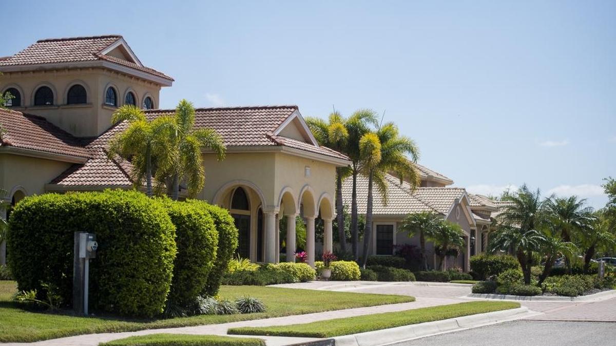 Homes in the Bougainvillea Place gated community are seen on Wednesday afternoon in Ellenton. Carlos Beruff's company Land Experts Inc. bought 47 parcels of land in this community, located just northeast of Ellenton Premium Outlets.