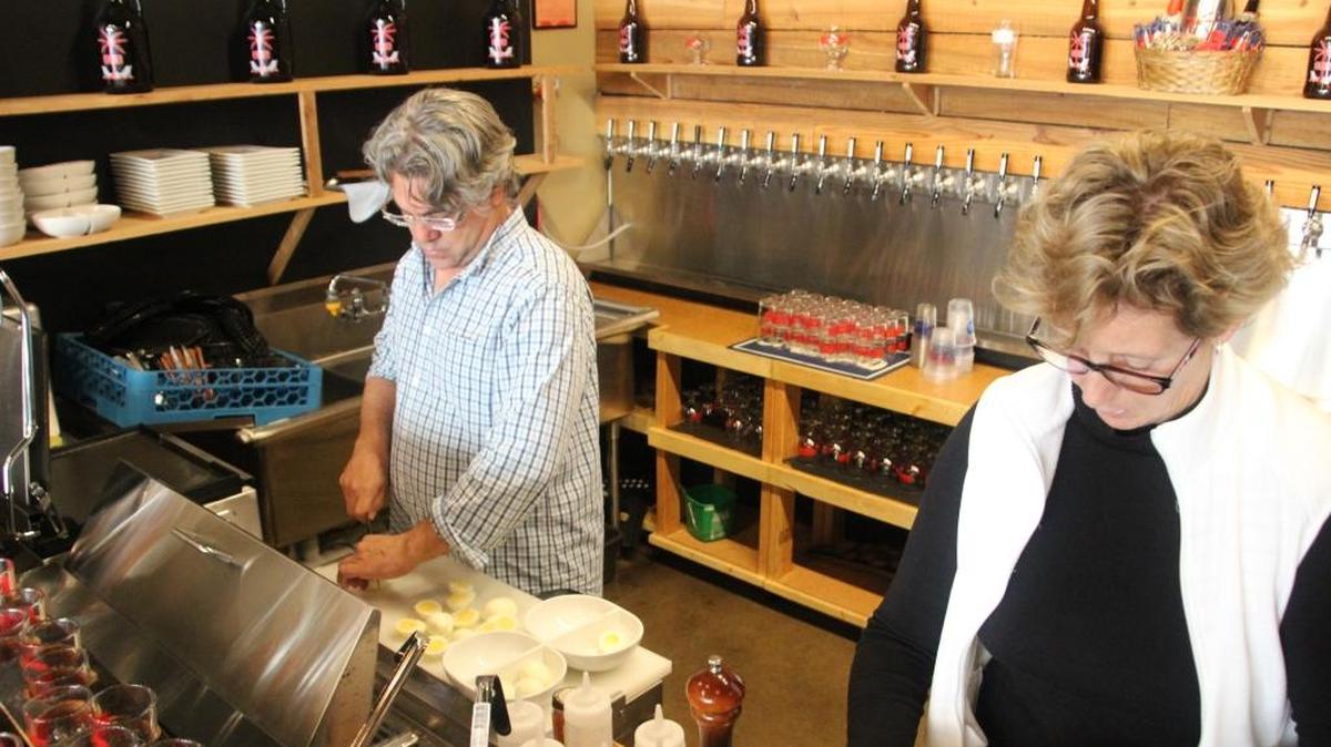 Mark Caragiulo and Jeanne Dooley prepared deviled eggs at Craft Growlers To Go & Tasting Room.