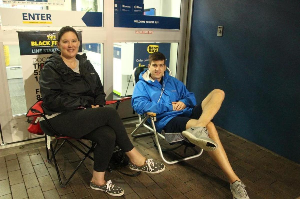 Jennifer Christman came to Best Buy on University Parkway with her son, Trent, to buy a 55-inch Toshiba TV for $279. They arrived at 4:55 a.m., several hours before the store opened.